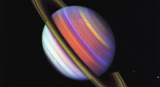 Three Voyager 2 images, taken through ultraviolet and green filters.
