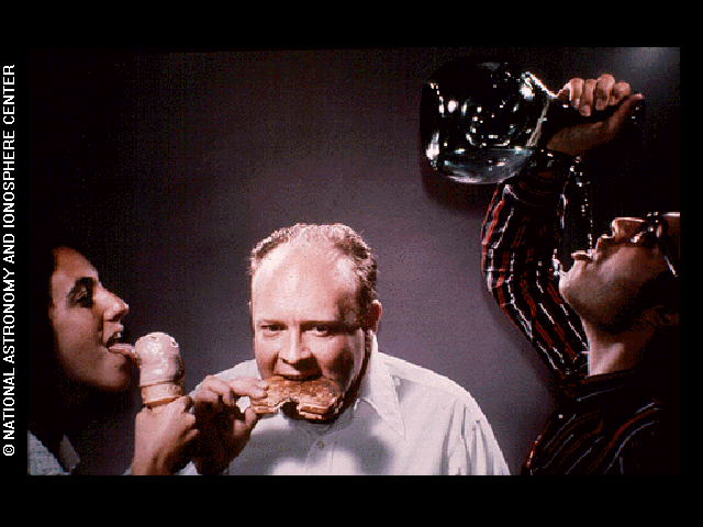The demonstration of licking, eating and drinking image is one of the pictures electronically placed on the phonograph records which are carried onboard the Voyager 1 and 2 spacecraft. Credit: National Astronomy and Ionosphere Center (NAIC)