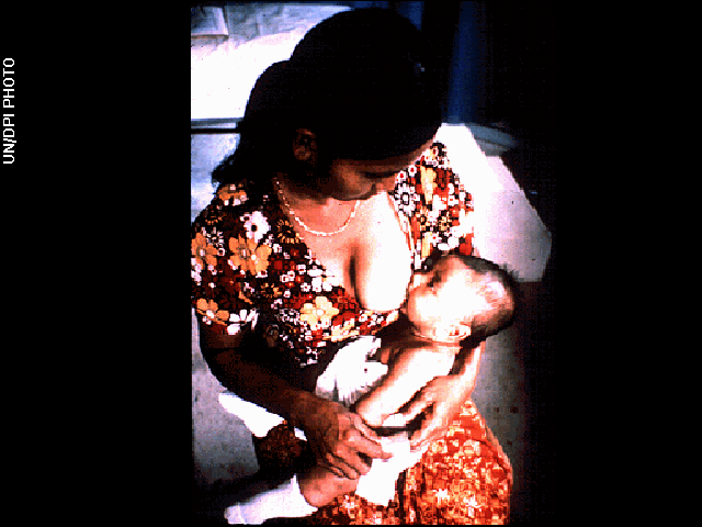 The nursing mother image is one of the pictures electronically placed on the phonograph records which are carried onboard the Voyager 1 and 2 spacecraft. Credit UN/DPI Photo