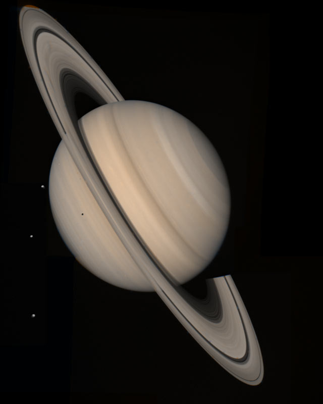 Saturn and three moons. Tethys. Dion and Rhea. Aug. 4, 1982. 13 million miles.
